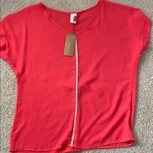 Francesca’s pink dress shirt